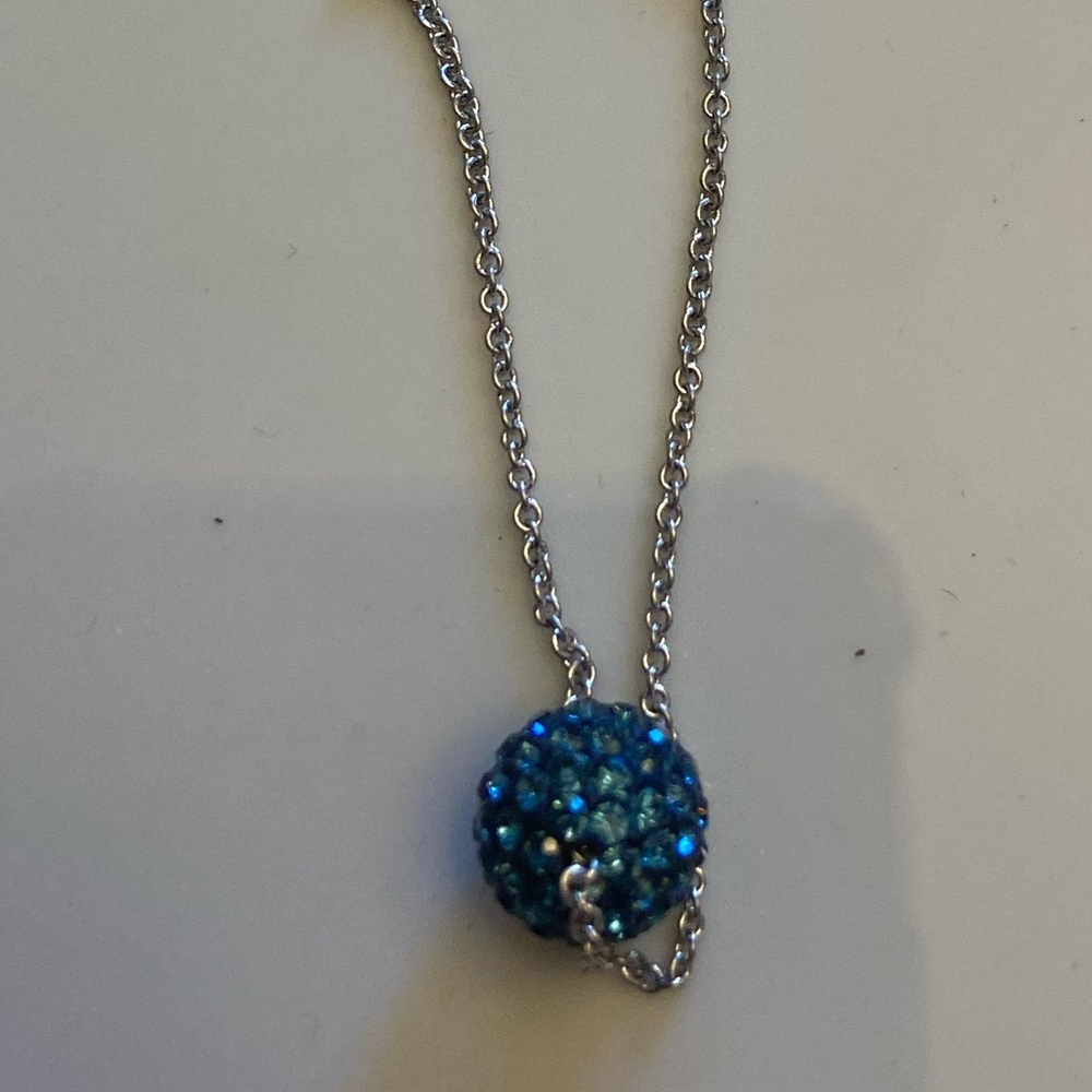 Touchstone Crystal blue birthstone necklace.